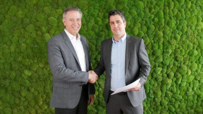 AspenTech President and CEO Antonio Pietri (l) and OMV Group’s SVP Michael Sattler