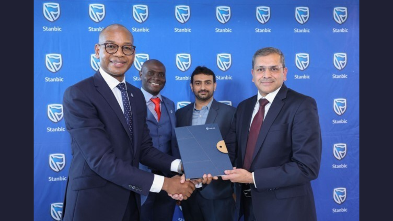 From Left to Right: Dr. Joshua Oigara, CEO at Stanbic Bank Kenya and South Sudan; Alex Siboe, Head of Technology at Stanbic Bank Kenya; Mustajab Ali, Director Business Development, MEA at Orion Innovation; and Anoop Gala Orion’s Global Head of Financial Services (PRNewsfoto/Orion Innovation)